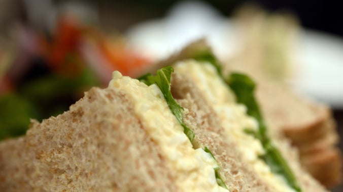 A close-up of egg sandwiches, cut into triangles in the café at Little Moreton Hall, Cheshire